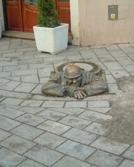 The Cumil The Peeper sculpture in Bratislava, Slowakia, Slovakia