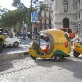 The typical Cuban coco taxi.